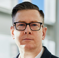 Alexander Hughes, PDG et dirigeant d'une entreprise de trading crypto, portrait